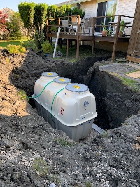 Photo of a bottomless sand filter installed on a property in Rhode Island. Able Engineering Inc. provides septic system design; water, sewer, and utility layout; stormwater design and management; erosion and sedimentation control plans; and other services in Rhode Island and Massachusetts.